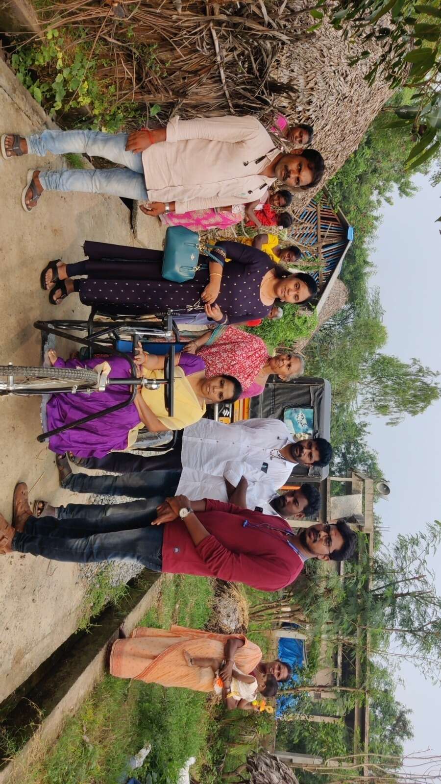 Sevak Smt Sudha donating tricycle
